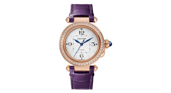 Cartier watch with a rose gold case, white dial, blue hands, and purple leather strap