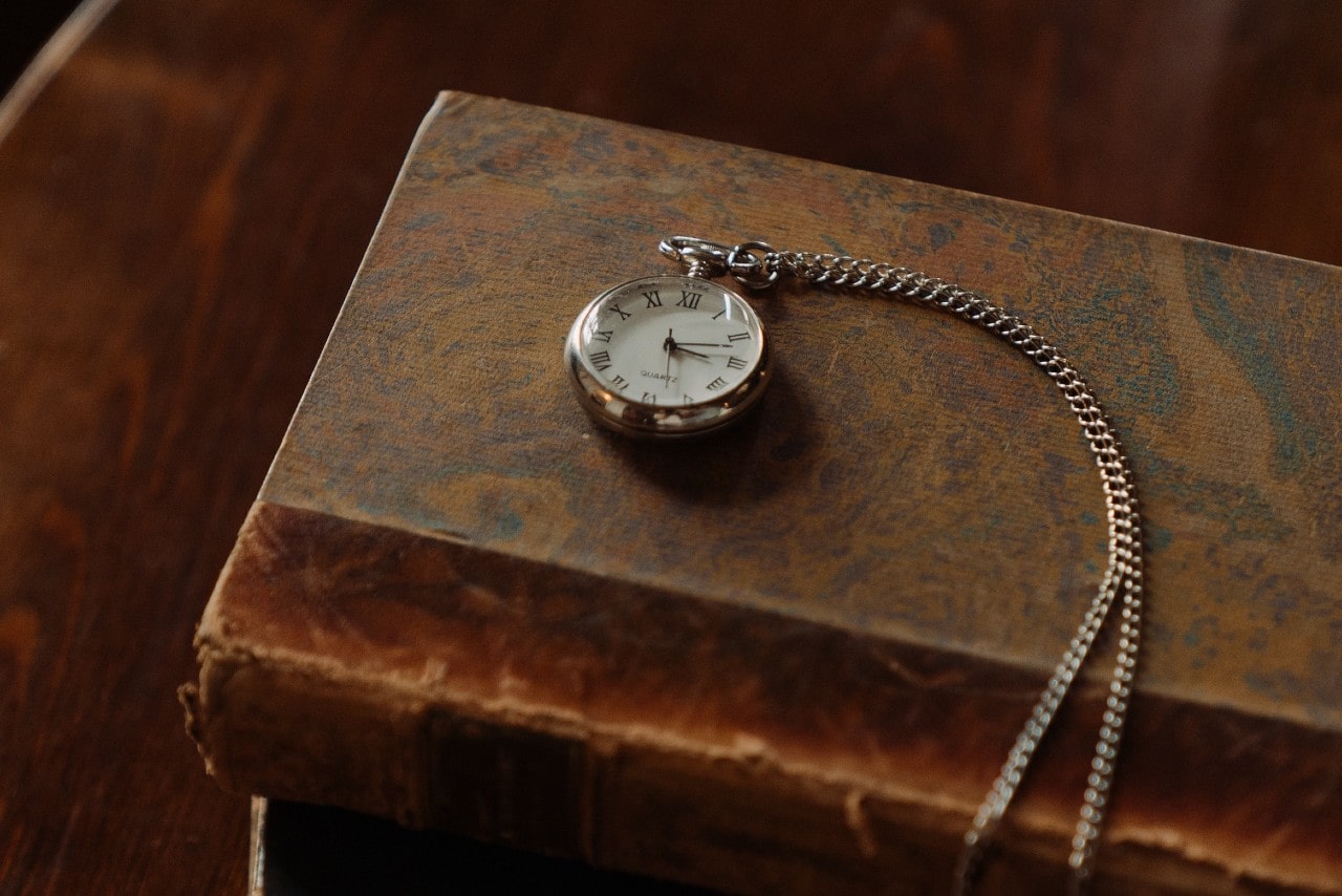 Pocketwatch sitting on a book