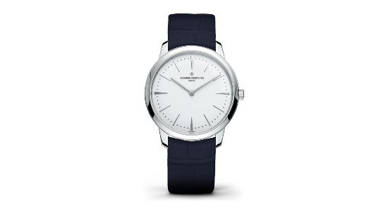 A silver Vacheron Constantin watch with a white dial and black leather strap