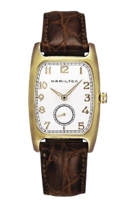 a Hamilton quartz watch with a rectangular watch dial and leather strap.
