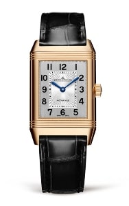 A Jaeger Le Coultre Reverso men’s watch with a rectangular dial.