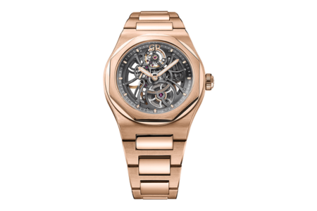 An elegant gold Girard-Perregaux watch with a distinctive skeleton dial, available at Hing Wa Lee Jewelers.