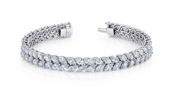 a white gold diamond tennis bracelet with two rows of diamonds