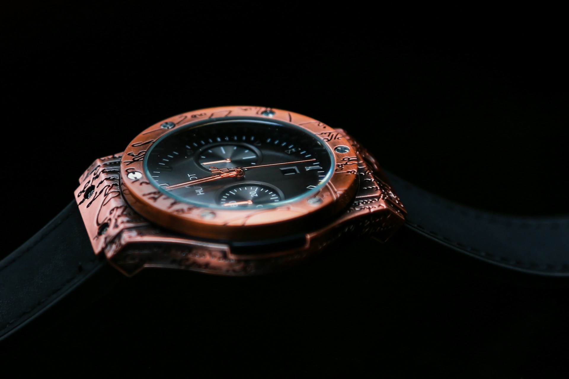 a Hublot watch on a black background